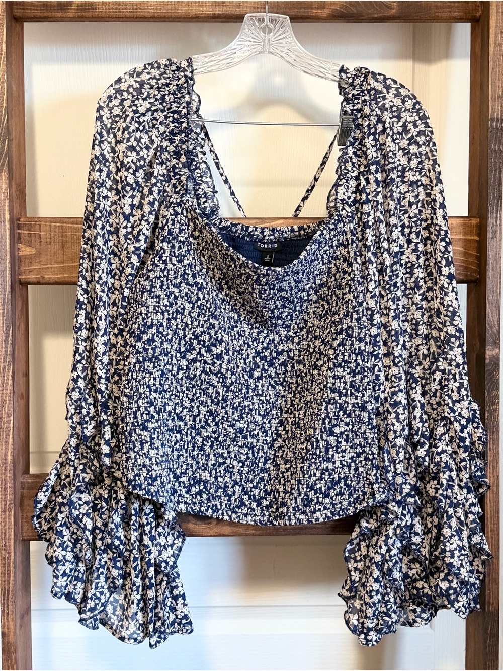 torrid navy and cream floral smocked blouse with ruffled long sleeves
